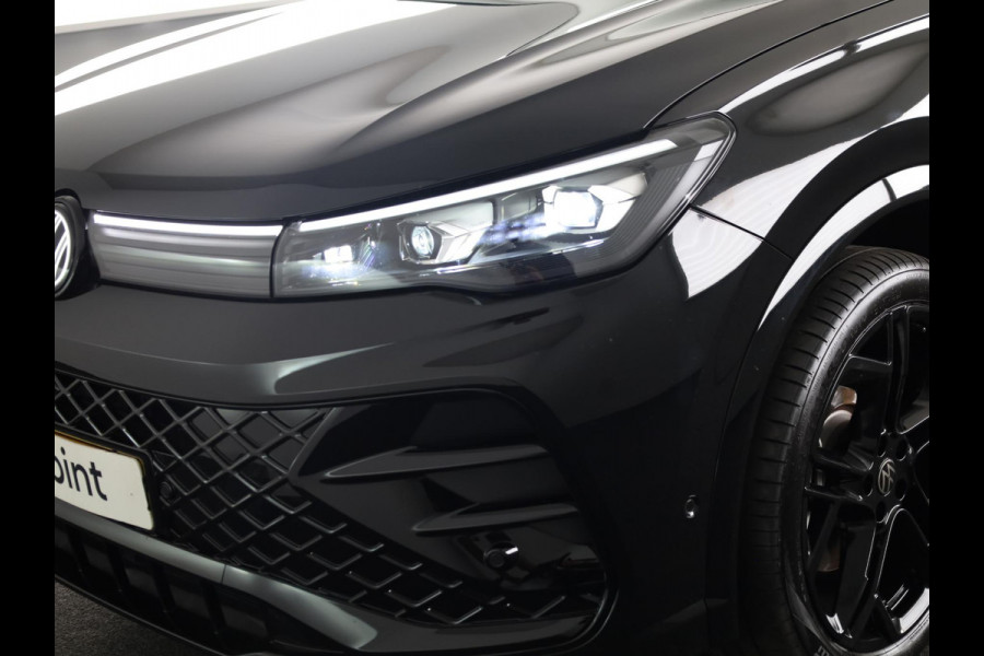 Volkswagen Tiguan 1.5 eHybrid R-Line Edition 272 pk Automaat (DSG) | Verlengde garantie | Navigatie | Panoramadak | Trekhaak (wegklapbaar) | Rondomzicht camera | Lederen bekleding |Stoelverwarming/ventilatie | R-Line |