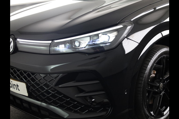 Volkswagen Tiguan 1.5 eHybrid R-Line Edition 272 pk Automaat (DSG) | Verlengde garantie | Navigatie | Panoramadak | Trekhaak (wegklapbaar) | Rondomzicht camera | Lederen bekleding |Stoelverwarming/ventilatie | R-Line |