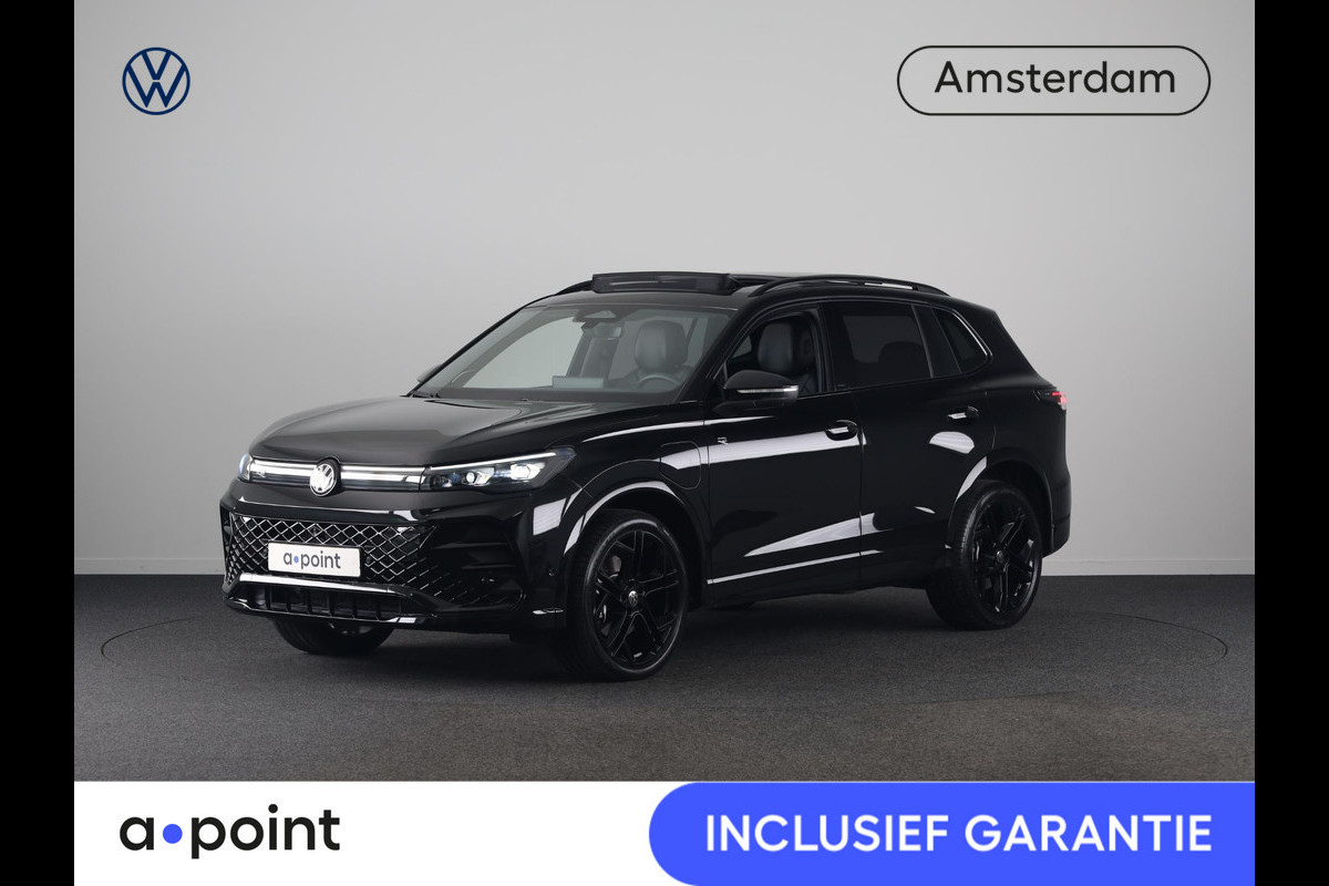 Volkswagen Tiguan 1.5 eHybrid R-Line Edition 272 pk Automaat (DSG) | Verlengde garantie | Navigatie | Panoramadak | Trekhaak (wegklapbaar) | Rondomzicht camera | Lederen bekleding |Stoelverwarming/ventilatie | R-Line |