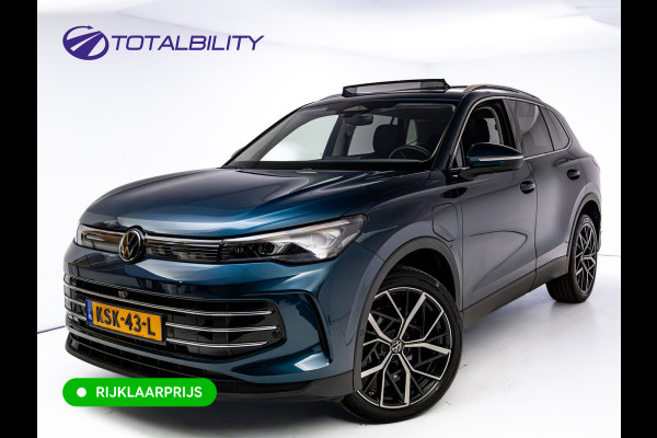 Volkswagen Tiguan 1.5 eHybrid Elegance Business 204 PK | Panodak | Leer | Elec. Trekhaak | Stoel- & Stuurverw. | Massagestoelen Dynamic Chassis control, Adaptieve Cruise, Sfeerverlichting, Ergo active stoel met geheugen, Incl. Winterset op LMV