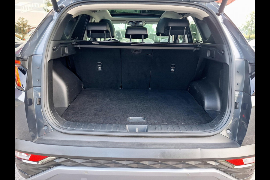 Hyundai Tucson 1.6 T-GDI PHEV Premium Sky 4WD | Full Options! | Dealer onderhouden! | Trekhaak | Pano | Leder | LED | Blindspot |