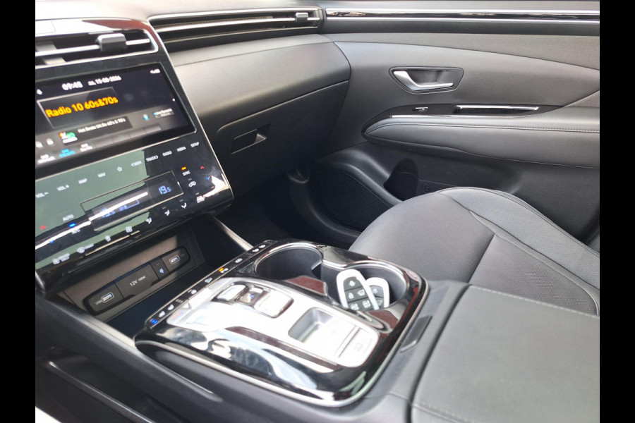 Hyundai Tucson 1.6 T-GDI PHEV Premium Sky 4WD | Full Options! | Dealer onderhouden! | Trekhaak | Pano | Leder | LED | Blindspot |