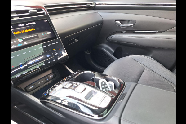 Hyundai Tucson 1.6 T-GDI PHEV Premium Sky 4WD | Full Options! | Dealer onderhouden! | Trekhaak | Pano | Leder | LED | Blindspot |