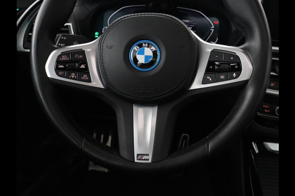 BMW iX3 Executive 80 kWh | SOH 93,8% | Panoramadak | Leder | Stoelverwarming | Adaptive cruise | Carplay | Sfeerverlichting | Camera | Park assist | Elektrische achterklep | PHEV