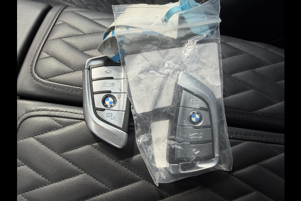 BMW 7 Serie 750Li xDrive High Executive M-Sport | Panoramadak | Sky Lounge | TV Schermen | Massage | Bowers & Wilkins |