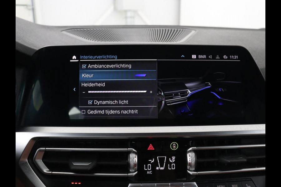 BMW 3 Serie Touring 330e Business Edition Plus | SOH 88,3% | Leder | Stoelverwarming | | Carplay | Navigatie | Park assist | Sfeerverlichting | Elektrische achterklep