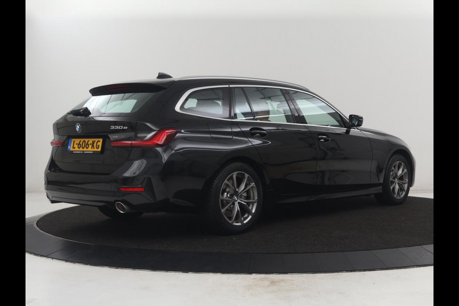 BMW 3 Serie Touring 330e Business Edition Plus | SOH 88,3% | Leder | Stoelverwarming | | Carplay | Navigatie | Park assist | Sfeerverlichting | Elektrische achterklep