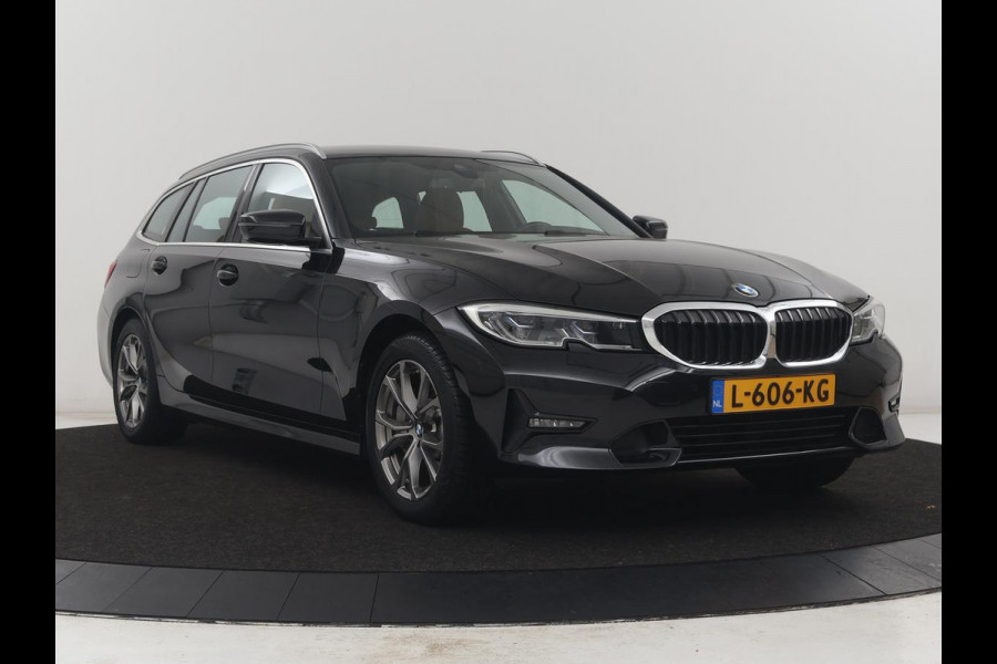 BMW 3 Serie Touring 330e Business Edition Plus | SOH 88,3% | Leder | Stoelverwarming | | Carplay | Navigatie | Park assist | Sfeerverlichting | Elektrische achterklep