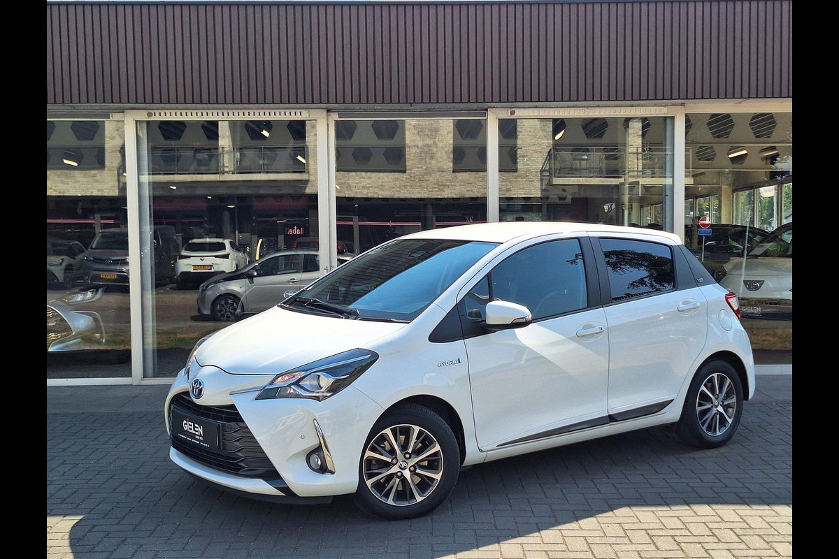 Toyota Yaris 1.5 Hybrid Y20 | Navigatie, Stoelverwarming, Lichtmetalen velgen, Privacy glass, Cruise control, Climate control