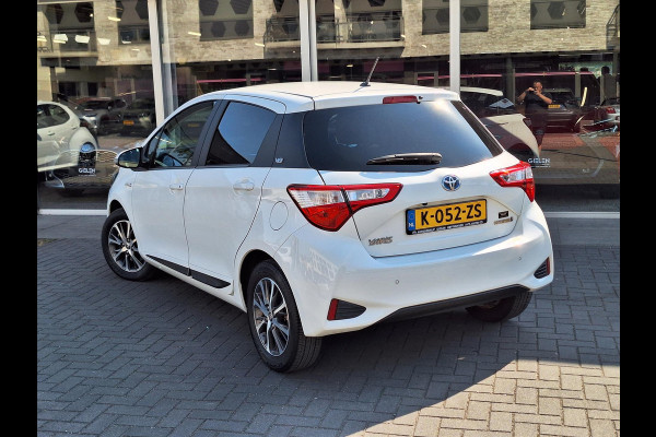 Toyota Yaris 1.5 Hybrid Y20 | Navigatie, Stoelverwarming, Lichtmetalen velgen, Privacy glass, Cruise control, Climate control