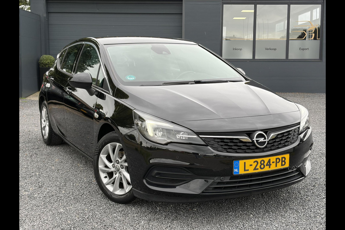 Opel Astra 1.2 Business Elegance 2e Eigenaar l Navi l Camera l Carplay l Keyless l Trekhaak l 110pk l Pdc V+A l Halfleder l 6 Bak l N.A.P l | Lm velgen l Rijstrooksensor l Apk tot 07-2027