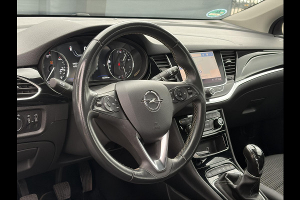 Opel Astra 1.2 Business Elegance 2e Eigenaar l Navi l Camera l Carplay l Keyless l Trekhaak l 110pk l Pdc V+A l Halfleder l 6 Bak l N.A.P l | Lm velgen l Rijstrooksensor l Apk tot 07-2027
