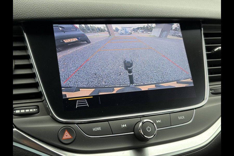 Opel Astra 1.2 Business Elegance 2e Eigenaar l Navi l Camera l Carplay l Keyless l Trekhaak l 110pk l Pdc V+A l Halfleder l 6 Bak l N.A.P l | Lm velgen l Rijstrooksensor l Apk tot 07-2027