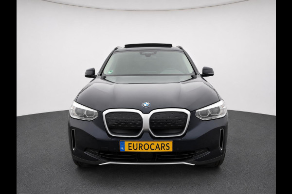 BMW iX3 High Executive Edition 80 kWh SOH 98,6% Panoramadak Trekhaak Navigatie Apple CarPlay Android Auto Camera Parkeerhulp Adaptive Cruise Control Stoelverwarming Full Led Leder Climate Control Lichtmetalen velgen