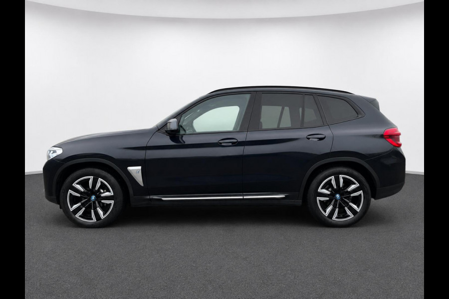 BMW iX3 High Executive Edition 80 kWh SOH 98,6% Panoramadak Trekhaak Navigatie Apple CarPlay Android Auto Camera Parkeerhulp Adaptive Cruise Control Stoelverwarming Full Led Leder Climate Control Lichtmetalen velgen