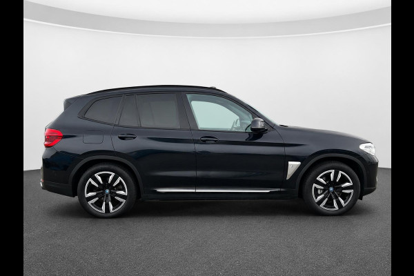 BMW iX3 High Executive Edition 80 kWh SOH 98,6% Panoramadak Trekhaak Navigatie Apple CarPlay Android Auto Camera Parkeerhulp Adaptive Cruise Control Stoelverwarming Full Led Leder Climate Control Lichtmetalen velgen