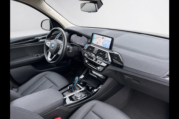 BMW iX3 High Executive Edition 80 kWh SOH 98,6% Panoramadak Trekhaak Navigatie Apple CarPlay Android Auto Camera Parkeerhulp Adaptive Cruise Control Stoelverwarming Full Led Leder Climate Control Lichtmetalen velgen