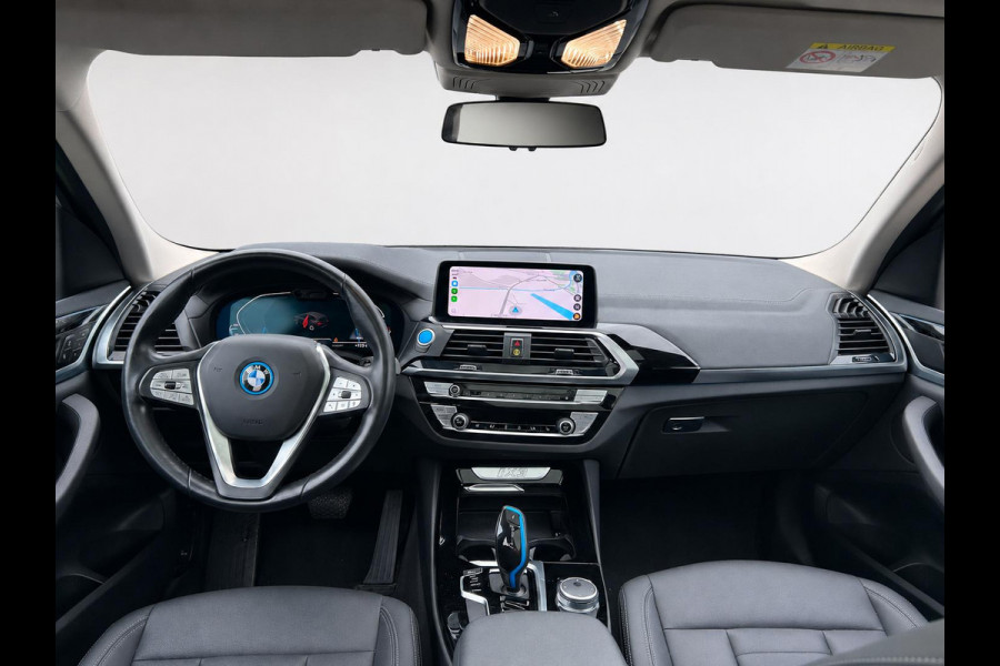 BMW iX3 High Executive Edition 80 kWh SOH 98,6% Panoramadak Trekhaak Navigatie Apple CarPlay Android Auto Camera Parkeerhulp Adaptive Cruise Control Stoelverwarming Full Led Leder Climate Control Lichtmetalen velgen