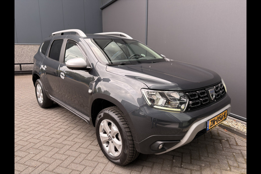Dacia Duster 1.2 TCe Comfort Achteruitrijcamera - Airco - Navigatie - Trekhaak - Cruise control - Dakrails - Radio - Mistlampen voor - Start/stop systeem - Led verlichting - Elektrische ramen - Stuur multifunctioneel - Centrale vergrendeling met afstandsbediening - Bluetooth