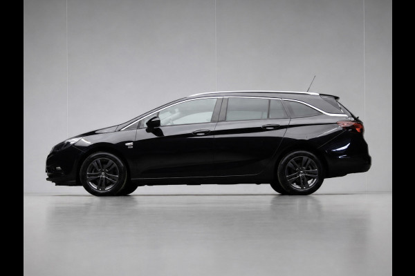 Opel Astra Sports Tourer 1.0 Turbo 120 Jaar Edition Sport (APPLE CARPLAY,NAVI,PDC,CLIMATE,CRUISE,GETINT,SPORTSTOELEN,LM VELGEN)