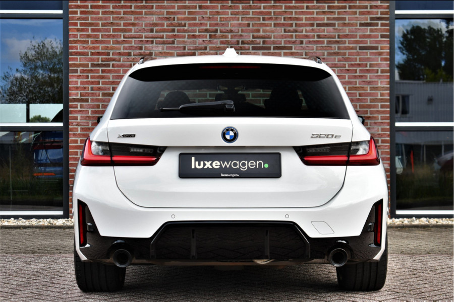 BMW 3 Serie Touring 320e xDrive M-Sport Pro Pano ACC Trekh El-zetels H/K 19inch