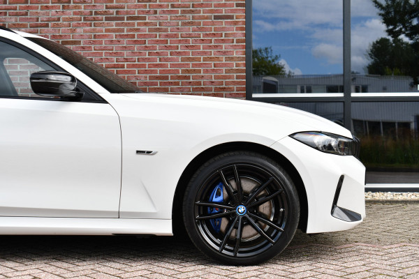 BMW 3 Serie Touring 320e xDrive M-Sport Pro Pano ACC Trekh El-zetels H/K 19inch