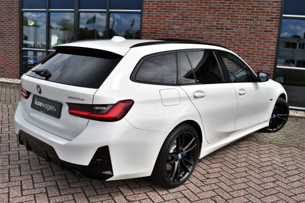BMW 3 Serie Touring 320e xDrive M-Sport Pro Pano ACC Trekh El-zetels H/K 19inch