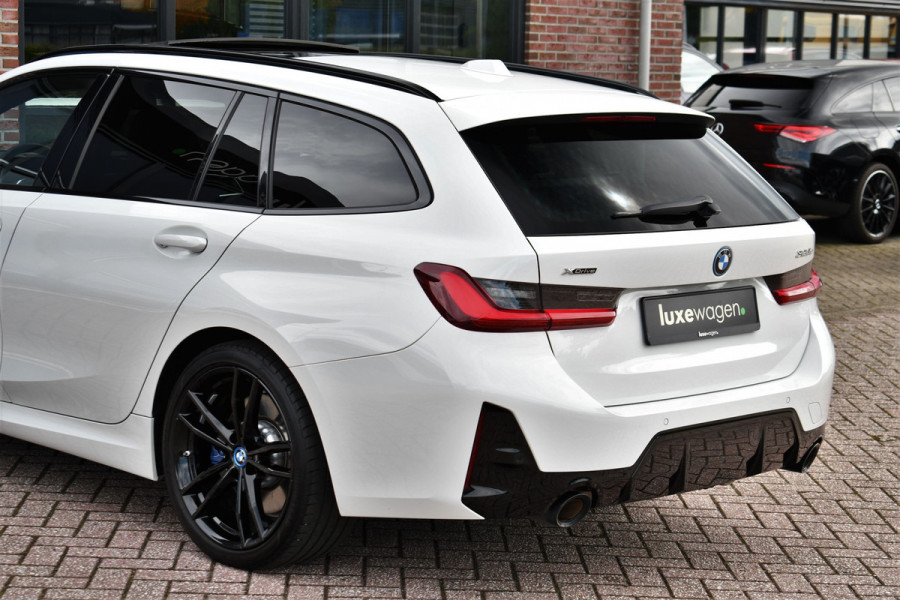 BMW 3 Serie Touring 320e xDrive M-Sport Pro Pano ACC Trekh El-zetels H/K 19inch