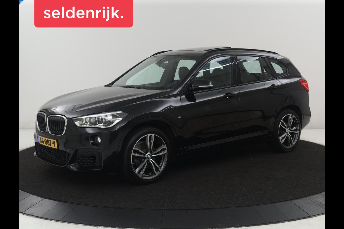 BMW X1 sDrive18i High Executive | Panoramadak | Leder | Stoelverwarming | Cruise control | Head-up | Navigatie | Bluetooth | Interieurverlichting | Elektrische achterklep | Trekhaak