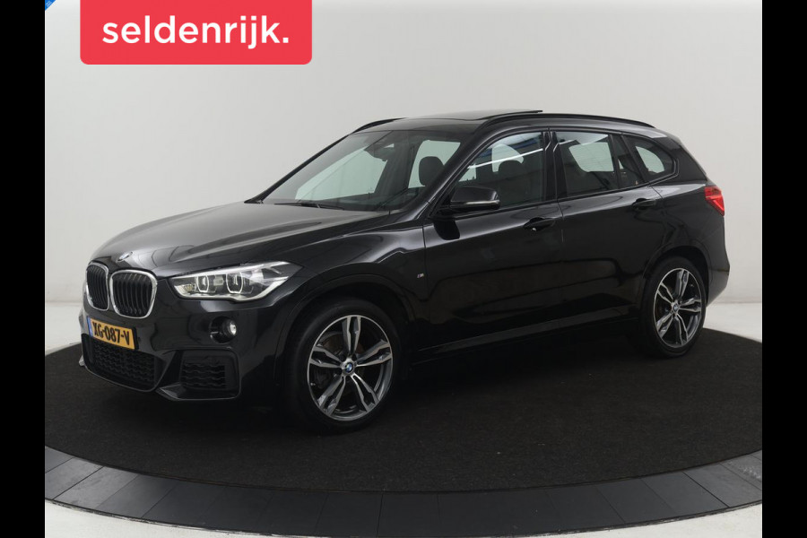 BMW X1 sDrive18i High Executive | Panoramadak | Leder | Stoelverwarming | Cruise control | Head-up | Navigatie | Bluetooth | Interieurverlichting | Elektrische achterklep | Trekhaak