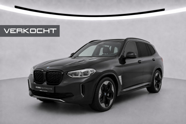 BMW iX3 High Executive 80 kWh | Panoramadak | Harman Kardon | Head-Up Display | Adaptive Cruise Control | Stoelverwarming | Dodehoekdetectie | Keyless | Trekhaak | Adaptief Onderstel | 360 Camera | Ambiance Verlichting |