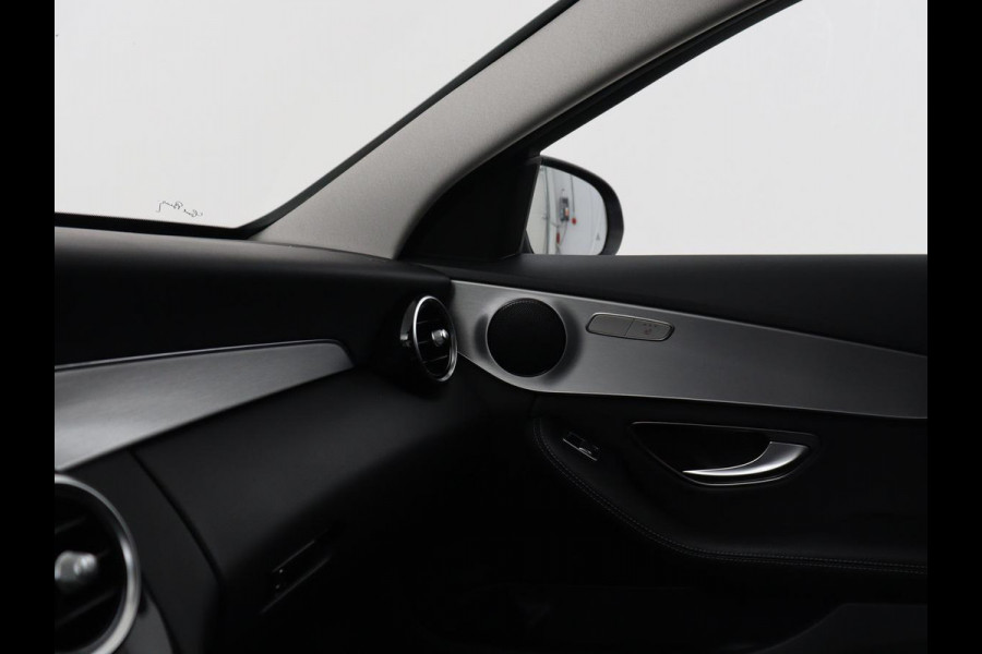 Mercedes-Benz C-Klasse Estate 180 Business Solution | Half leder | Stoelverwarming | Navigatie | Bluetooth | Camera | Park assist | Cruise control | Climate control | Elektrische achterklep | Trekhaak
