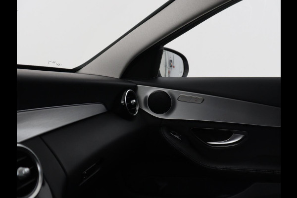 Mercedes-Benz C-Klasse Estate 180 Business Solution | Half leder | Stoelverwarming | Navigatie | Bluetooth | Camera | Park assist | Cruise control | Climate control | Elektrische achterklep | Trekhaak