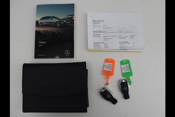 Mercedes-Benz C-Klasse Estate 180 Business Solution | Half leder | Stoelverwarming | Navigatie | Bluetooth | Camera | Park assist | Cruise control | Climate control | Elektrische achterklep | Trekhaak