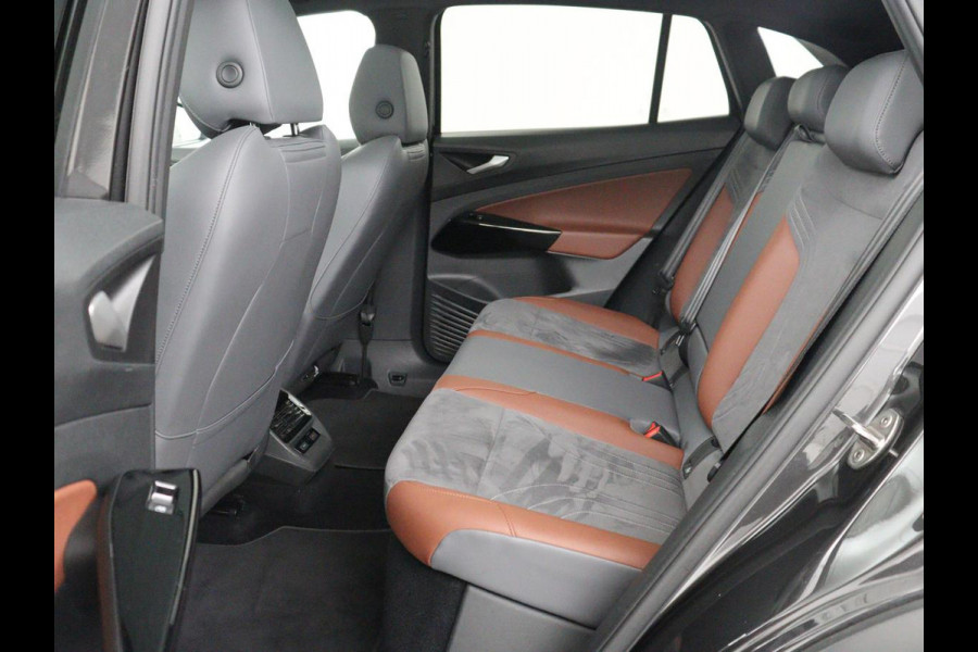 Volkswagen ID.4 First Max 77 kWh | SOH 91,7% | Memory | Panoramadak | Half leder | Head-up | Stoelverwarming | Adaptive cruise | Lane assist | Sfeerverlichting | Carplay | 360 camera | Elektrische achterklep