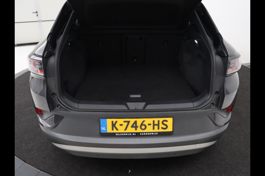 Volkswagen ID.4 First Max 77 kWh | SOH 91,7% | Memory | Panoramadak | Half leder | Head-up | Stoelverwarming | Adaptive cruise | Lane assist | Sfeerverlichting | Carplay | 360 camera | Elektrische achterklep
