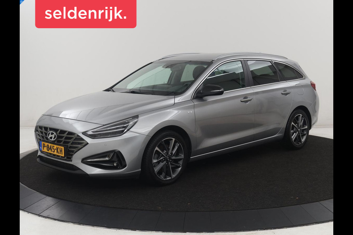 Hyundai i30 Wagon 1.5 T-GDi MHEV Premium | Leder | Stuur/stoel verwarming | Stoel ventilatie | Cruise control | Lane assist | Camera | Park assist | Climate control | Trekhaak