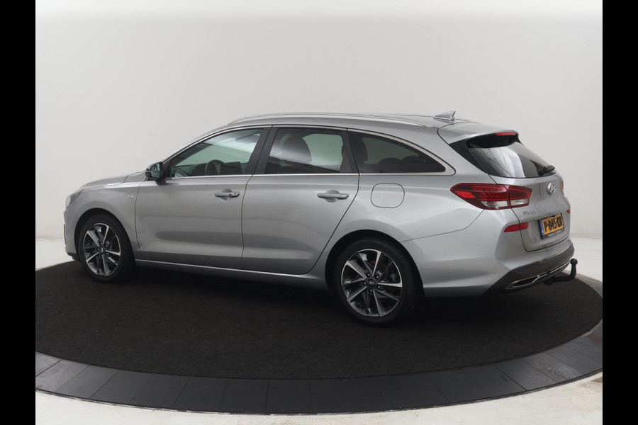 Hyundai i30 Wagon 1.5 T-GDi MHEV Premium | Leder | Stuur/stoel verwarming | Stoel ventilatie | Cruise control | Lane assist | Camera | Park assist | Climate control | Trekhaak