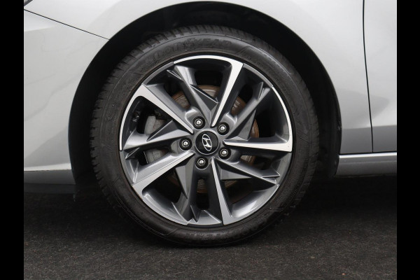 Hyundai i30 Wagon 1.5 T-GDi MHEV Premium | Leder | Stuur/stoel verwarming | Stoel ventilatie | Cruise control | Lane assist | Camera | Park assist | Climate control | Trekhaak