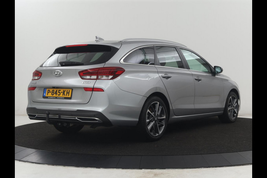 Hyundai i30 Wagon 1.5 T-GDi MHEV Premium | Leder | Stuur/stoel verwarming | Stoel ventilatie | Cruise control | Lane assist | Camera | Park assist | Climate control | Trekhaak