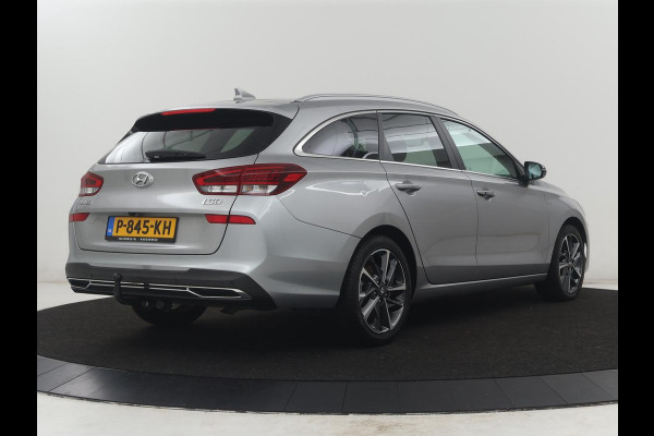 Hyundai i30 Wagon 1.5 T-GDi MHEV Premium | Leder | Stuur/stoel verwarming | Stoel ventilatie | Cruise control | Lane assist | Camera | Park assist | Climate control | Trekhaak
