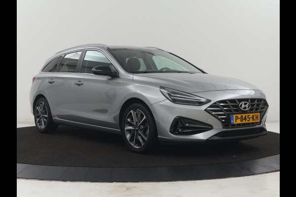 Hyundai i30 Wagon 1.5 T-GDi MHEV Premium | Leder | Stuur/stoel verwarming | Stoel ventilatie | Cruise control | Lane assist | Camera | Park assist | Climate control | Trekhaak