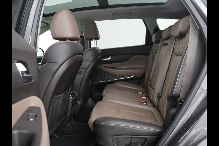 Hyundai Santa Fe 1.6 T-GDI HEV Comfort Smart Sky 7p | Panoramadak | Leder | Stoelverwarming | Adaptive cruise | Climate control | Carplay | Camera | Park assist | Trekhaak