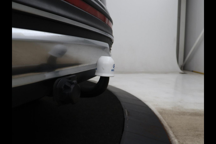 Hyundai Santa Fe 1.6 T-GDI HEV Comfort Smart Sky 7p | Panoramadak | Leder | Stoelverwarming | Adaptive cruise | Climate control | Carplay | Camera | Park assist | Trekhaak