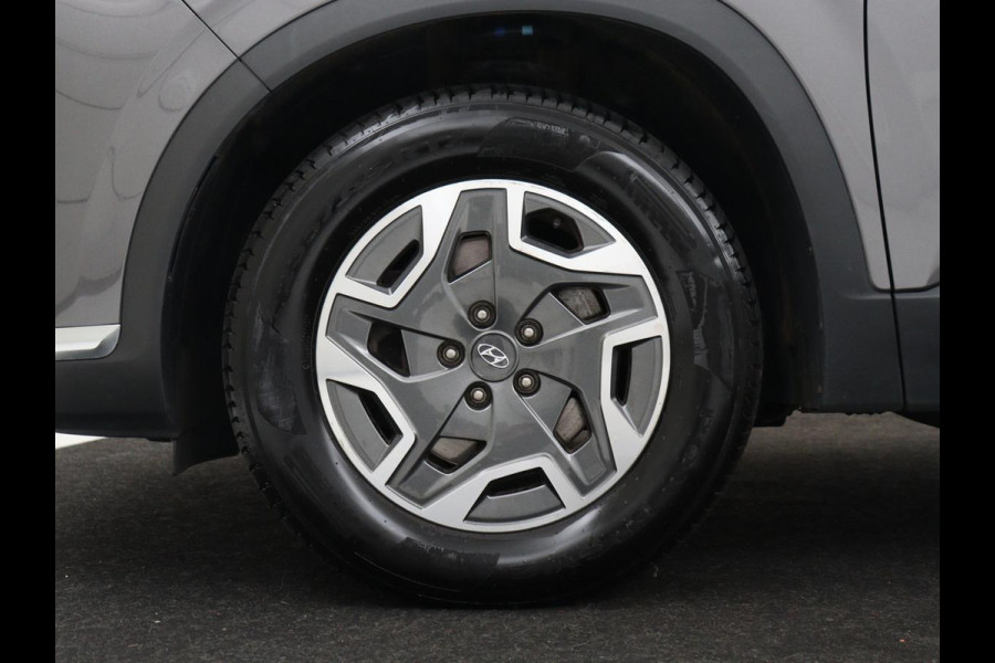 Hyundai Santa Fe 1.6 T-GDI HEV Comfort Smart Sky 7p | Panoramadak | Leder | Stoelverwarming | Adaptive cruise | Climate control | Carplay | Camera | Park assist | Trekhaak