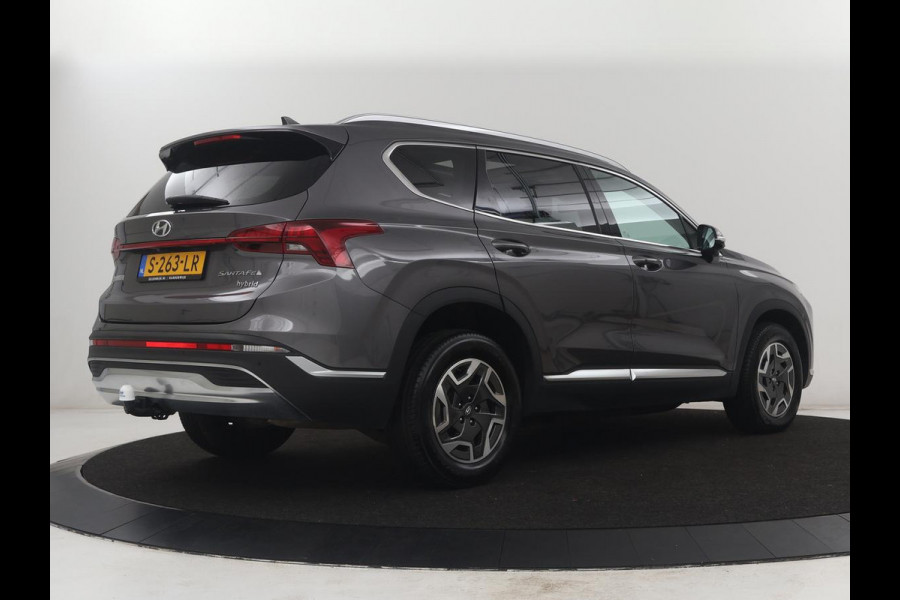 Hyundai Santa Fe 1.6 T-GDI HEV Comfort Smart Sky 7p | Panoramadak | Leder | Stoelverwarming | Adaptive cruise | Climate control | Carplay | Camera | Park assist | Trekhaak