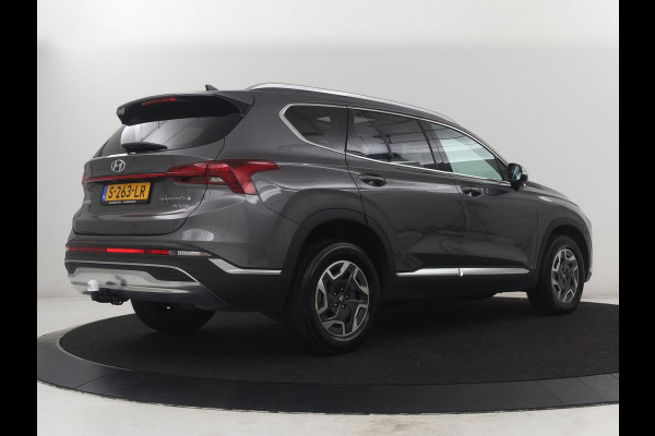Hyundai Santa Fe 1.6 T-GDI HEV Comfort Smart Sky 7p | Panoramadak | Leder | Stoelverwarming | Adaptive cruise | Climate control | Carplay | Camera | Park assist | Trekhaak