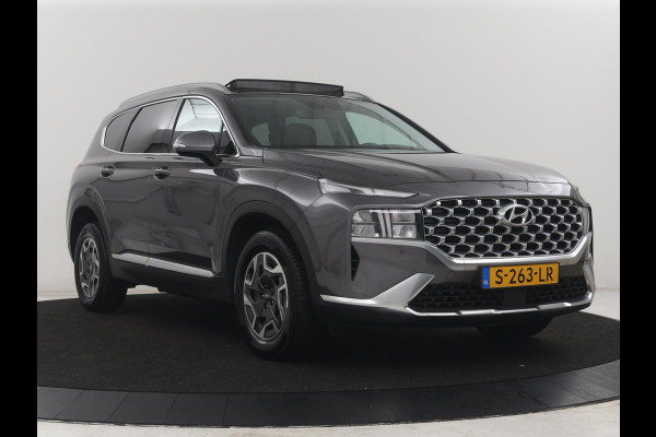 Hyundai Santa Fe 1.6 T-GDI HEV Comfort Smart Sky 7p | Panoramadak | Leder | Stoelverwarming | Adaptive cruise | Climate control | Carplay | Camera | Park assist | Trekhaak