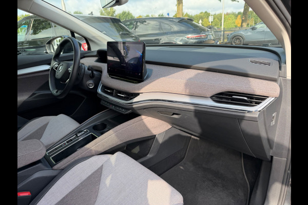 Škoda ENYAQ iV 60 First Edition / SoH 93,1% / Camera / CarPlay / Keyless / Matrix LED / 20'' / Dodehoek / Stoelverwarming / DAB / ACC