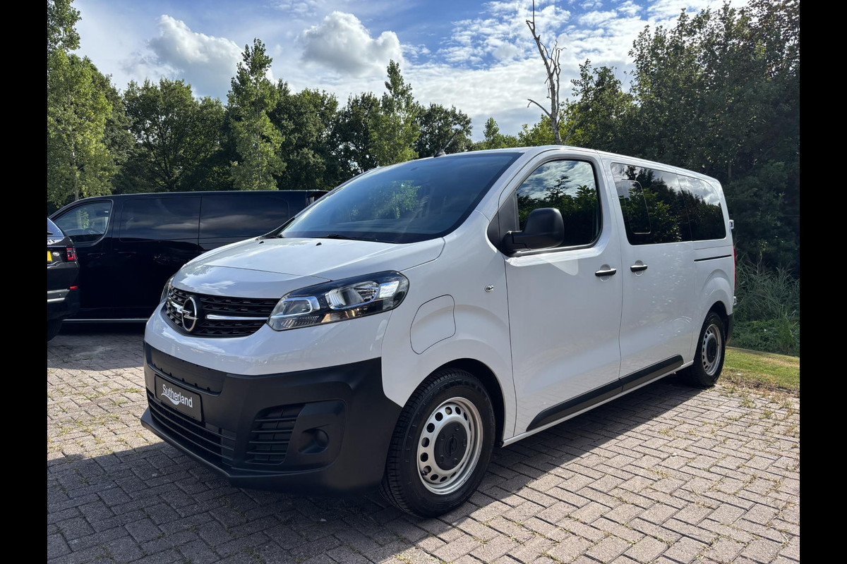 Opel Vivaro-e Combi L2H1 50 kWh 136 PK | 9.585 KM! | Climate Control | 9-persoons | Dubbele Zij-Schuifdeur | Privacy-Glass